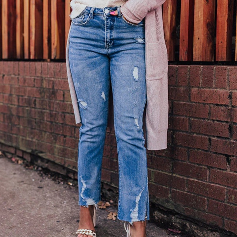 High-waist distressed jeans, medium wash denim